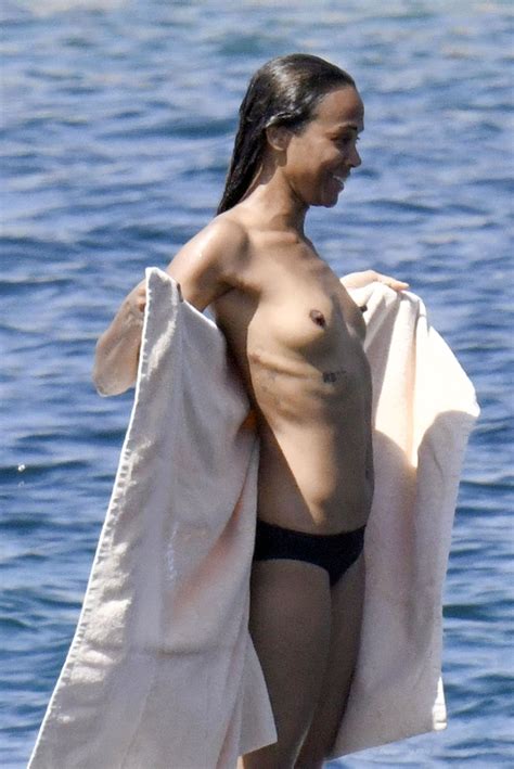 Zoe Saldana Sexy And Topless On A Boat In Italy August