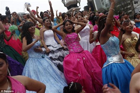 quinceanera dresses on display as hundreds of teenage girls march through mexico city daily