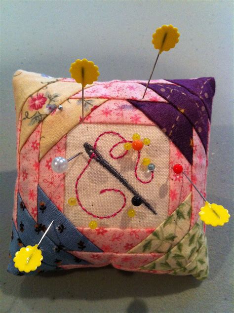 paper pieced pin cushion pattern from piece in the hoop pin cushions quilting projects
