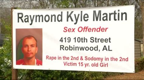 man uses yard sign to pressure sex offender to move