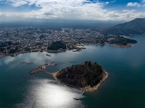 List of lakes by volume. #TravelTuesday Lake Kawaguchiko Japan #AerialPhotography Image by Marco Verch - licensed under ...