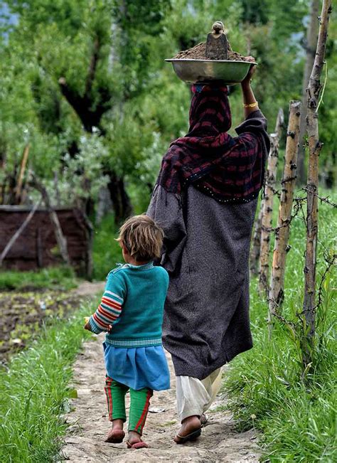 A Woman In Budgam District Of Kashmir With Her Child 14 Stunning