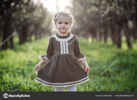 Cute Girl In The Garden Telegraph