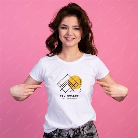 Premium Psd Person With Excited Expression Pointing To Tshirt Mockup