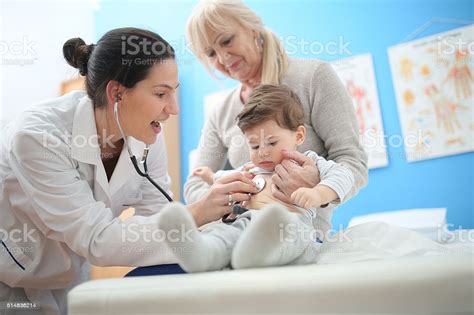 A pediatrician is a specialist who works with children from the time they are born through their youth. Pediatrician Stock Photo - Download Image Now - iStock
