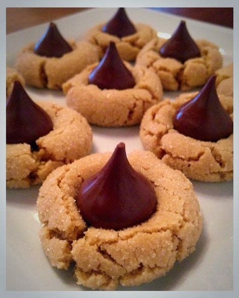 The second thanksgiving is over i am thinking, christmas cookies. Kiss Blossoms | Hershey kiss cookie recipe, Kiss cookie ...