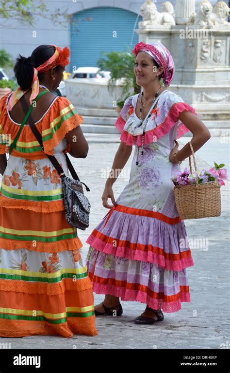 Two Women In Traditional Costume Old Town Havana Cuba Stock Photo