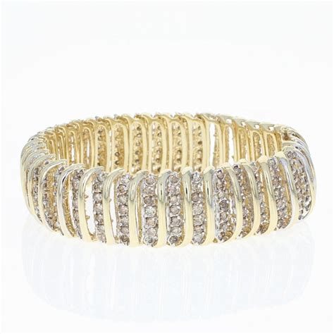 Maybe you would like to learn more about one of these? Diamond Link Bracelet, 10 Karat Yellow Gold Brown Round Cut 10.00 Carat For Sale at 1stDibs