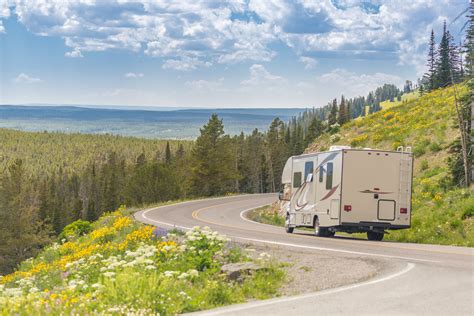 Maybe you would like to learn more about one of these? Camper Driving Down Road in The Beautiful Countryside ...