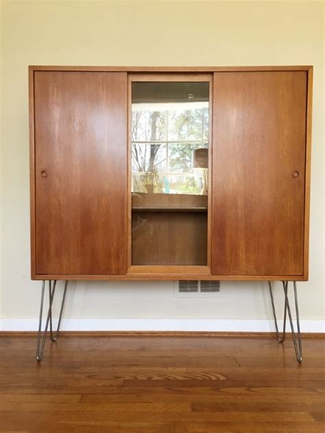 First, mount your (2 x 4″) frame onto the wall space you have designated for your sliding door tool case cabinet. Mid Century Modern Illuminated Display Cabinet, Sliding ...