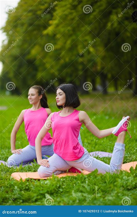 Fitness Sport Girls In Sportswear Doing Yoga Fitness Exercise Outdoor