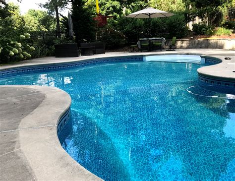 dark bottom pool vs light one of the main advantages of a dark bottom pool ebony blue is