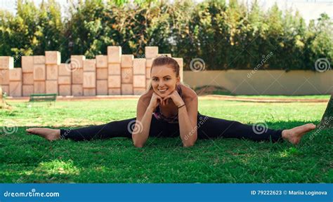 Cute Girl Practicing Sport On The Grass Stock Image Image Of