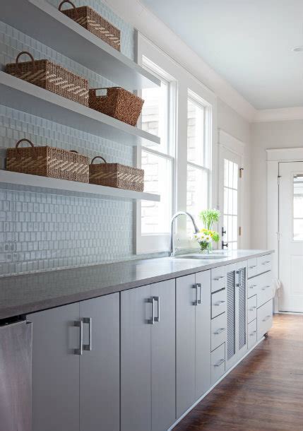 White Flat Front Kitchen Cabinets With Gray Quartz Counters And
