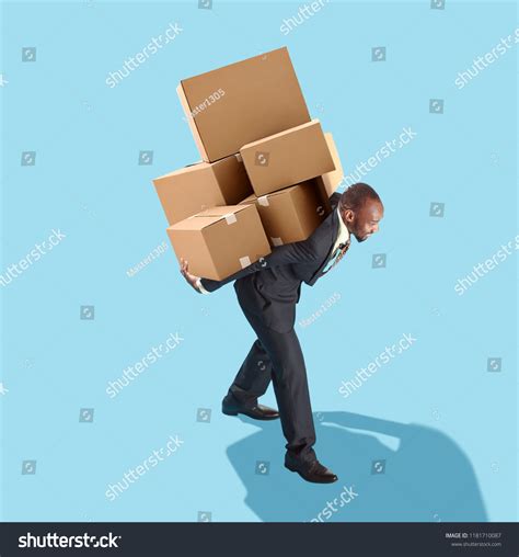 Carrying Heavy Load Over 20737 Royalty Free Licensable Stock Photos