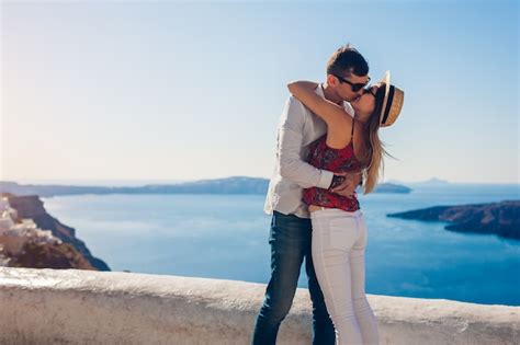 premium photo couple in love kissing during honeymoon