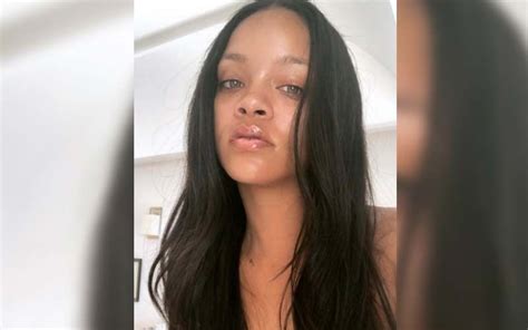 Rihanna Goes Topless By The Pool And Flaunts Her Beautiful Tattoos The