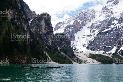 Natural Landscape Of Lake Lago Di Braies Landscape With Dolomiti Snowy