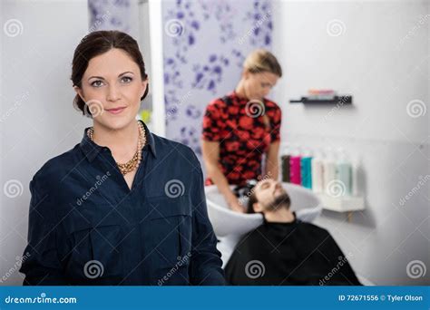 Portrait Of Beautiful Hairdresser In Salon Stock Photo Image Of