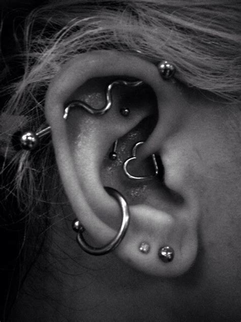 Effortlessly flaunt your sense of fashion with these additions. 25 CHARMING EAR PIERCING INSPIRATIONS...... - Godfather Style