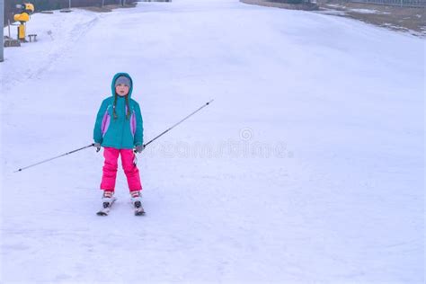 A Little Girl Is Skiing On A Slope Kid Is Skiing In The Snow Stock