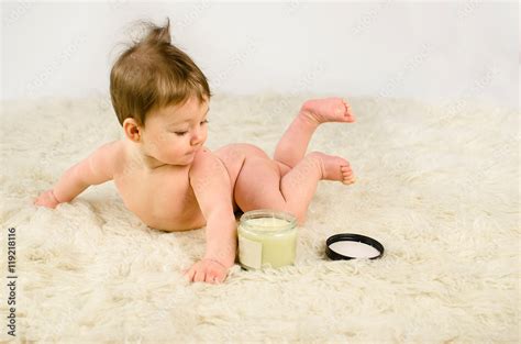 Cute Baby Girl Naked With Cream Stock Photo Adobe Stock