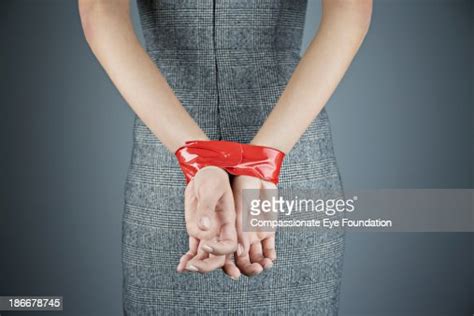 Woman With Hands Tied Behind Back Bildbanksbilder Getty Images