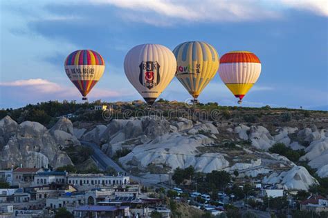 Hot Air Balloons Fly Over The City Of Goreme Editorial Photography