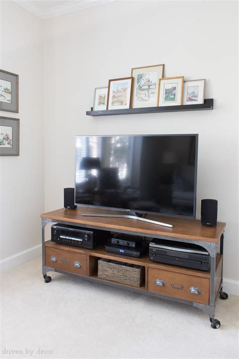 How To Decorate Above The Tv A Simple Solution Driven By Decor