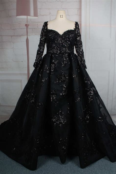 black plus size long sleeve ball gown from darius cordell long sleeve ball gowns black
