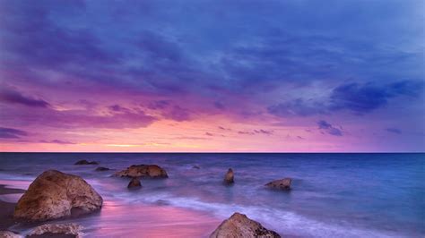 2560x1440 Sunset Ocean Water Rock Beach 5k 1440p Resolution Hd 4k