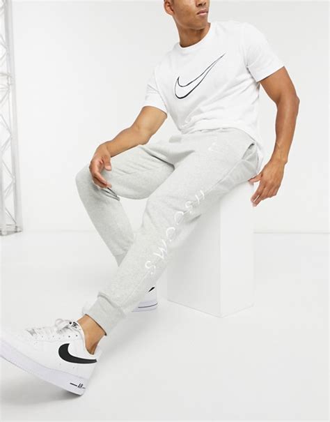 Nike Swoosh Cuffed Joggers In Grey Asos