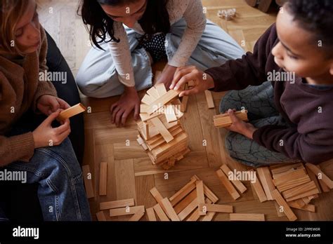 Children Playing Jenga At Home Stock Photo Alamy