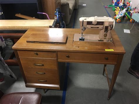 just picked up this 1950 s singer 401a in a beautiful cabinet for 20 at gw i ve wanted a