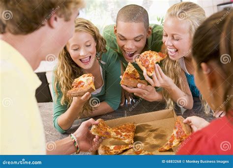 Group Of Teenagers Eating Pizza Stock Photo Image Of Group Diet 6883268