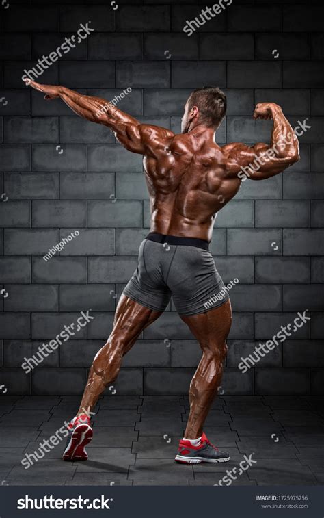 Strong Muscular Men Flexing Muscles Back Stock Photo Edit Now 1725975256