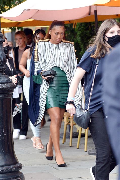 Naomi Osaka Goes Bold In A Striped Tunic Top And A Green Leather Skirt At