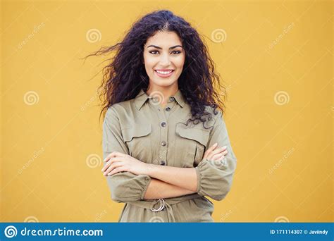 Young Arab Woman With Curly Hair Outdoors Stock Image Image Of Moving