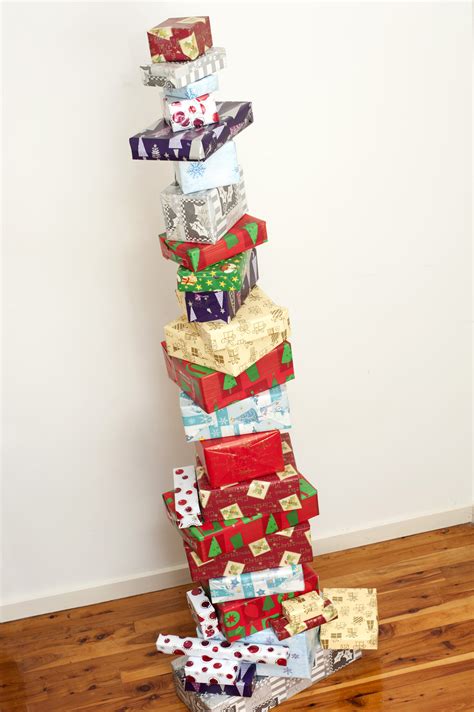 Christmas shopping for your mom might feel extremely difficult because you know she deserves the world. Photo of Stacked tower of colourful Christmas gifts | Free ...