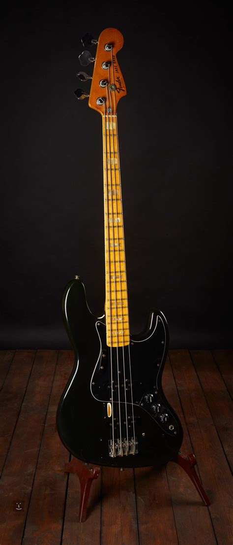 The electric bass guitar was first designed in the 1950s. FENDER 1980 Jazz Bass Black Electric Bass Guitar