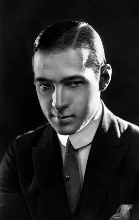 Vintage 1920s men's hairstyles exemplified the refined gentleman. 1920s Hairstyles For Men - Classy Cuts Topped With A Hat