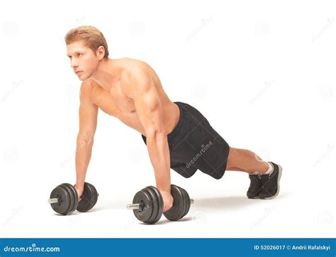 Muscular Shirtless Sportsman Doing Push Ups With Dumbbells On White