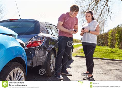 If you are driving someone else's car and suggest using their auto insurance to drive, make sure there is an explicit knowledge of whose insurance will cover responsibility and cover general losses. Two Drivers Exchange Insurance Details After Accident Stock Photo - Image of claim, male: 31863766
