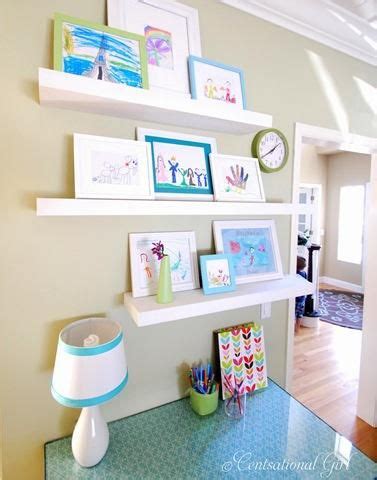 In the living room, leave plenty of space for furniture by displaying metal picture frames and marble sculptures on wall shelves. 19 Ways to Display Kids' School Art Projects | Playroom ...