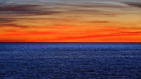 Download 1920x1080 Wallpaper Skyline Sunset Sky Sea Nature 4k
