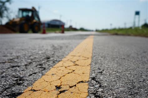 The Road Surface Is Broken Into Longitudinal Lines On The Yellow