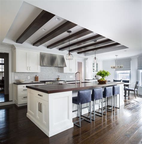 If crown molding is already specified for the room the coffered ceiling is being created within, adding molding to individual soffits may not be necessary. Coffered kitchen ceilings kitchen transitional with tray ...