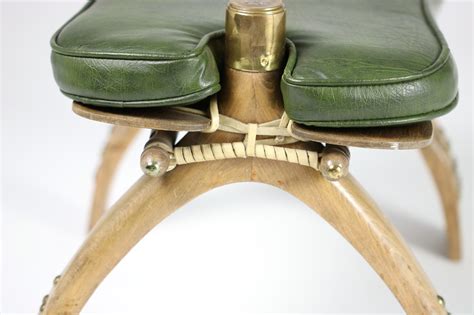 This junior camel saddle is a miniature model of a camel saddle that john has had since he was a child living in malaysia. 20th century wood, etched brass & leather Egyptian camel ...