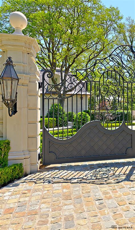 The original iron gates | front gate design ideas. Custom wrought iron entry gate; gorgeous entry! Love ...
