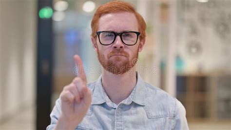 Serious Young Redhead Man Saying No By Finger Sign Stock Image Image